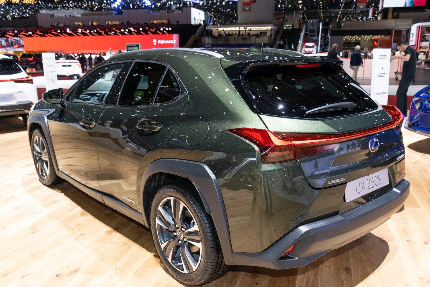 Rear view with LED tail lights and hybrid badge of a luxury compact SUV