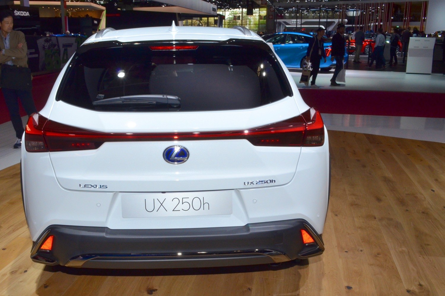Rear view of luxury hybrid crossover with LED tail lights and aerodynamic design