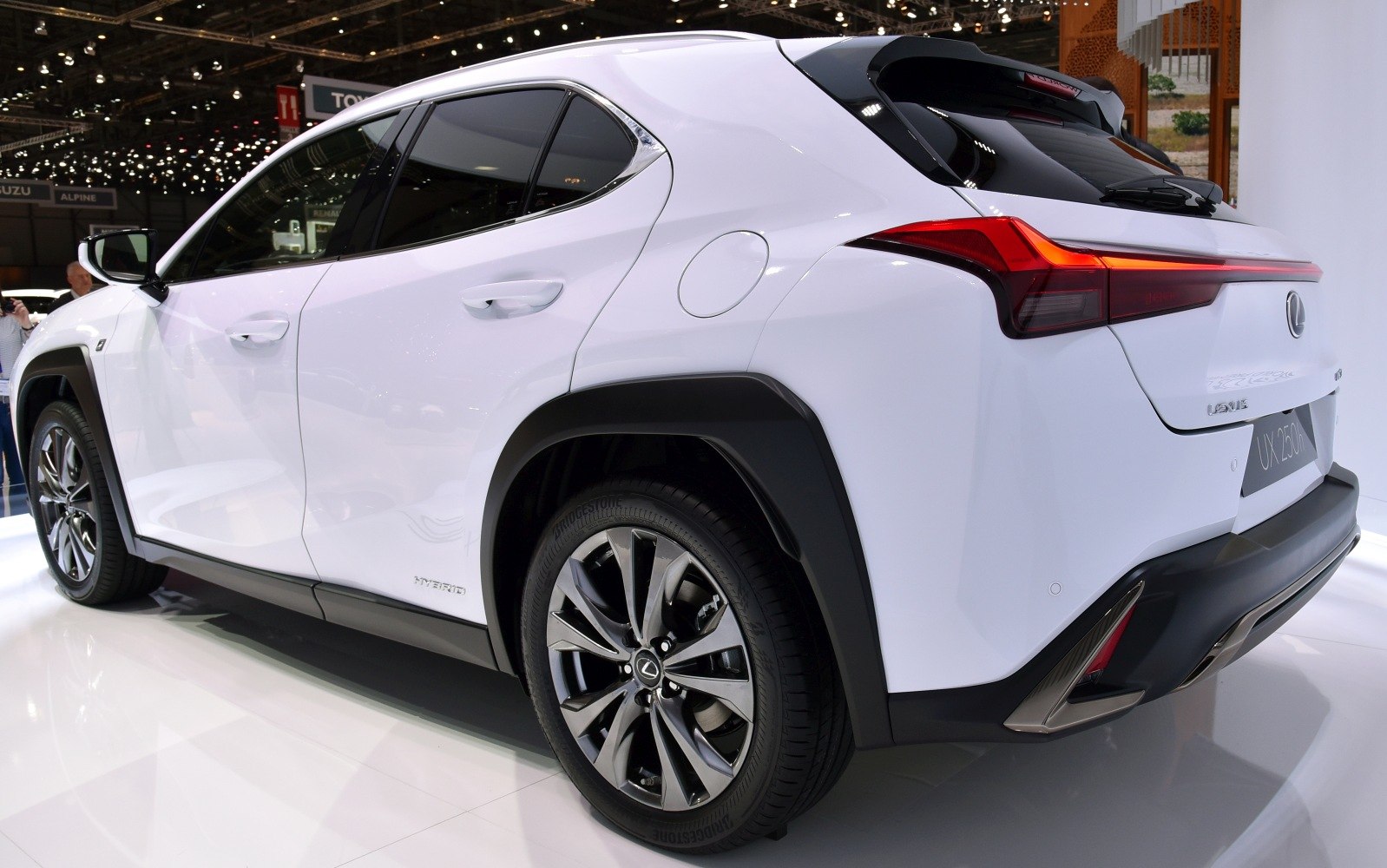 Sharp rear LED lights and alloy wheels on white hybrid SUV