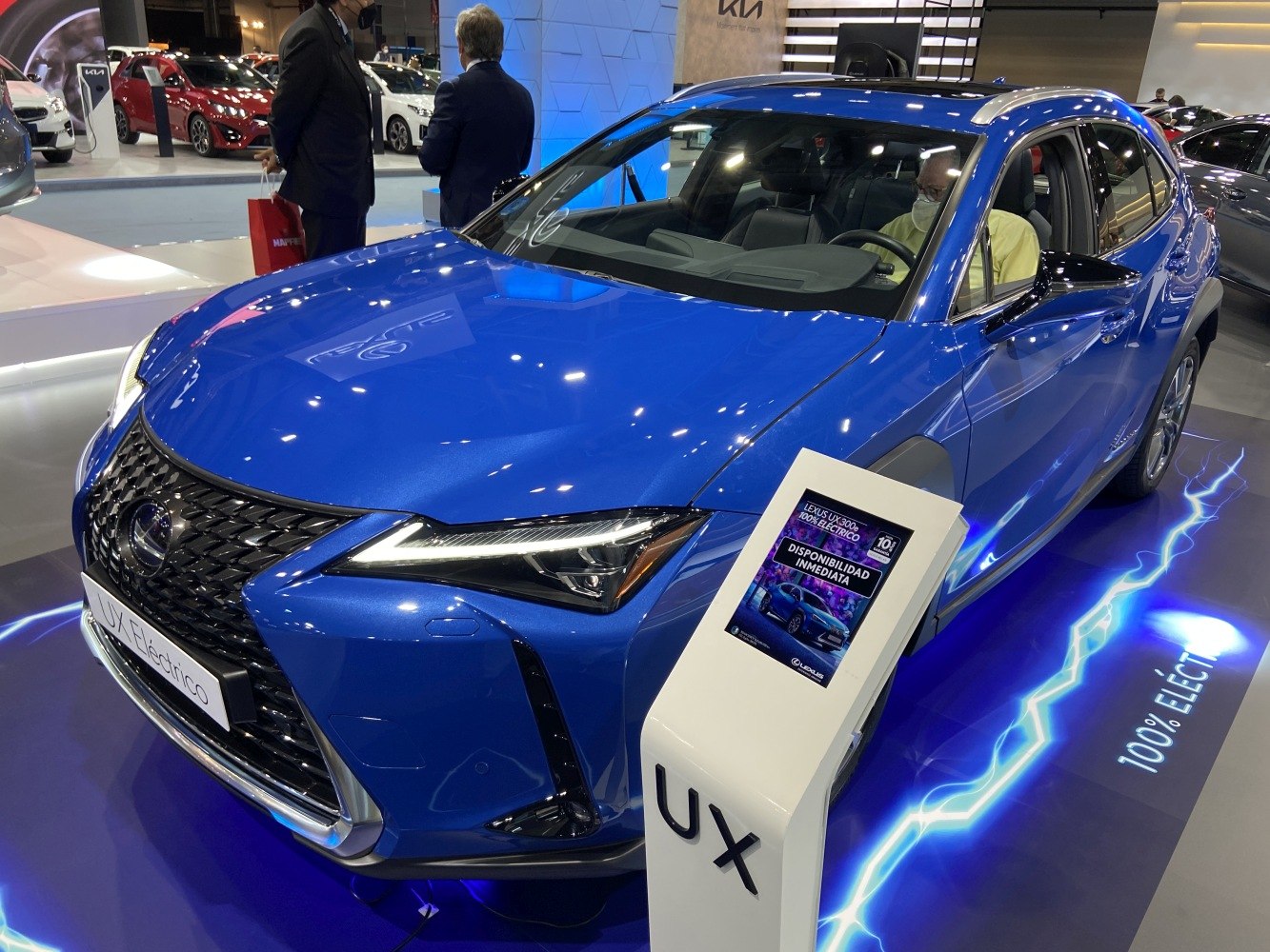 Front view of electric crossover with LED headlights and distinctive grille