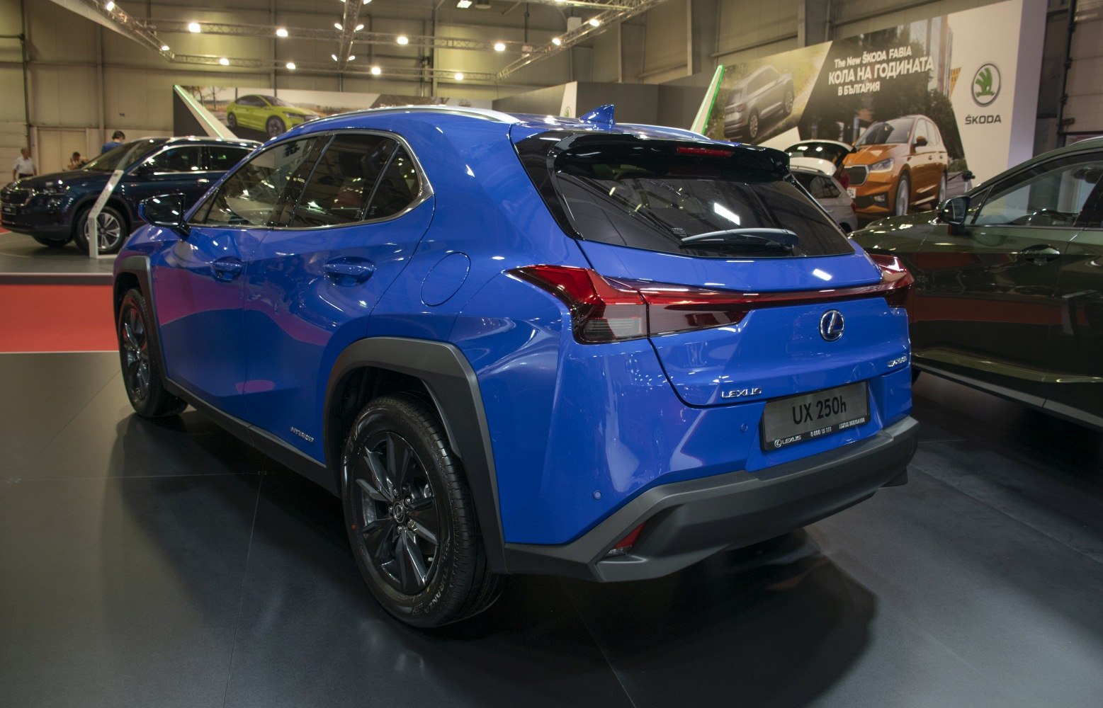 Blue compact hybrid SUV rear with dynamic taillights and modern design
