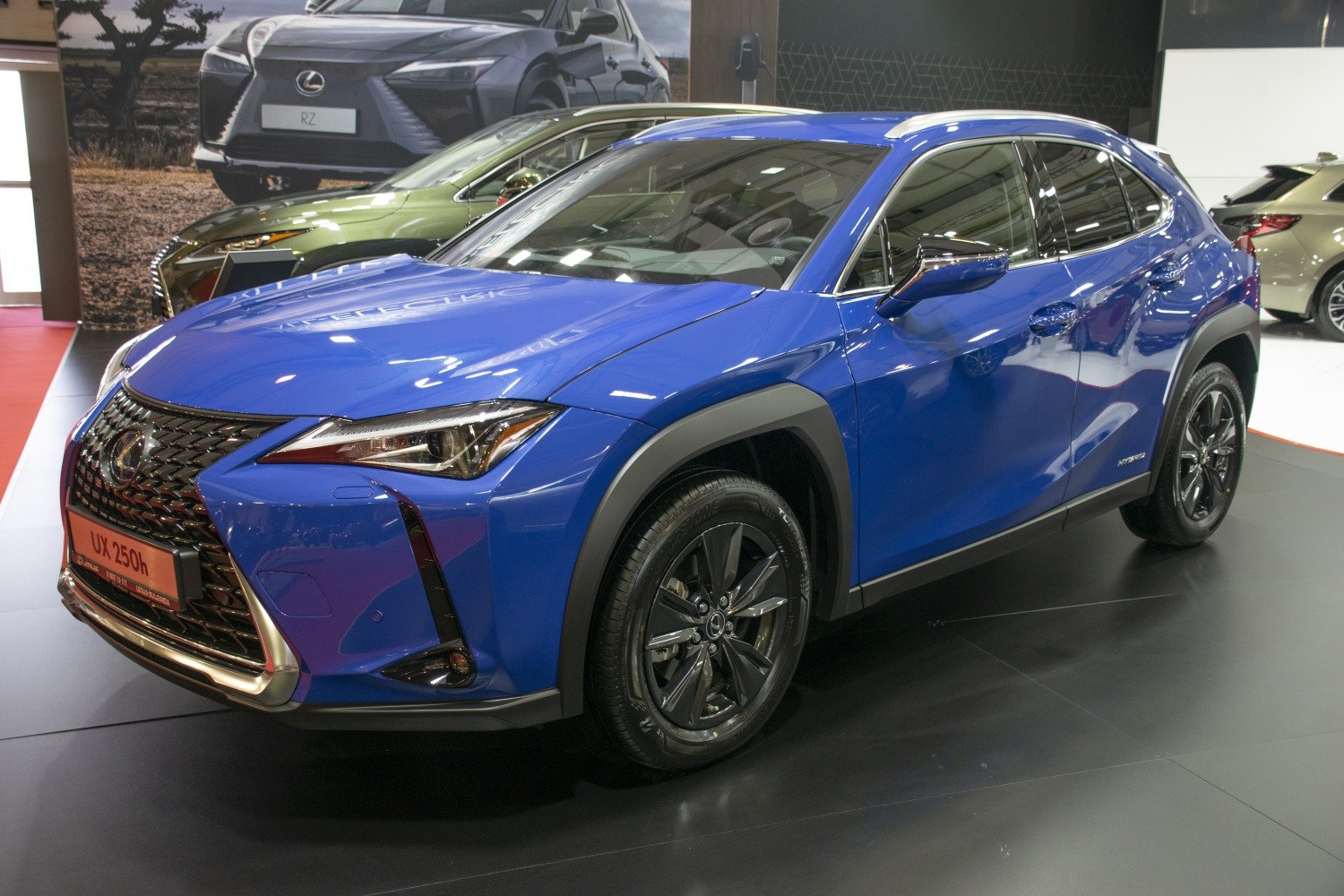Blue hybrid compact SUV, front and side angled view, modern design
