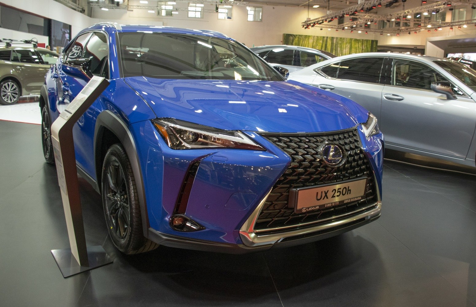 Spindle grille and sleek LED headlights on compact hybrid SUV