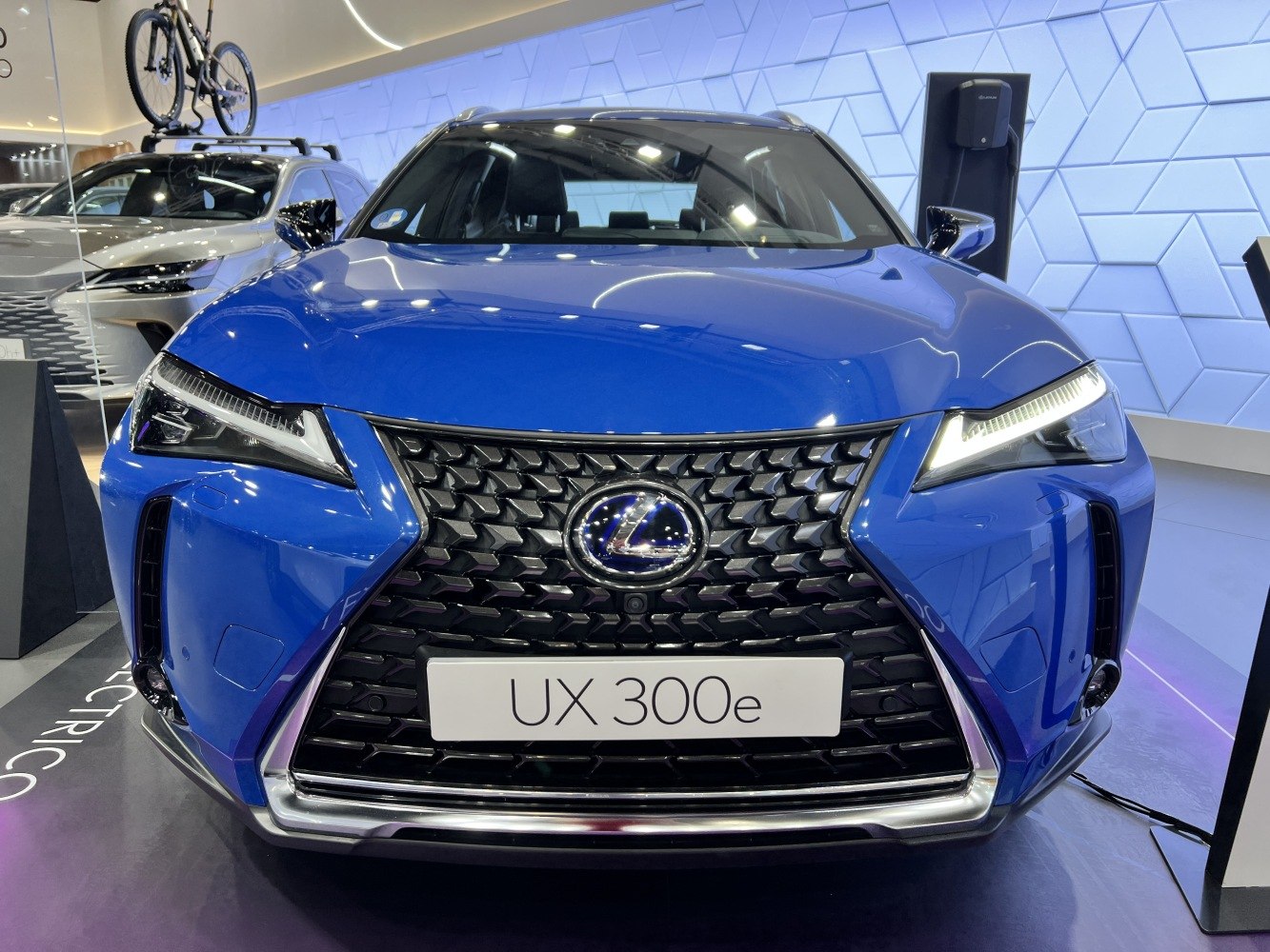 Front grille and LED headlights of a modern luxury compact SUV