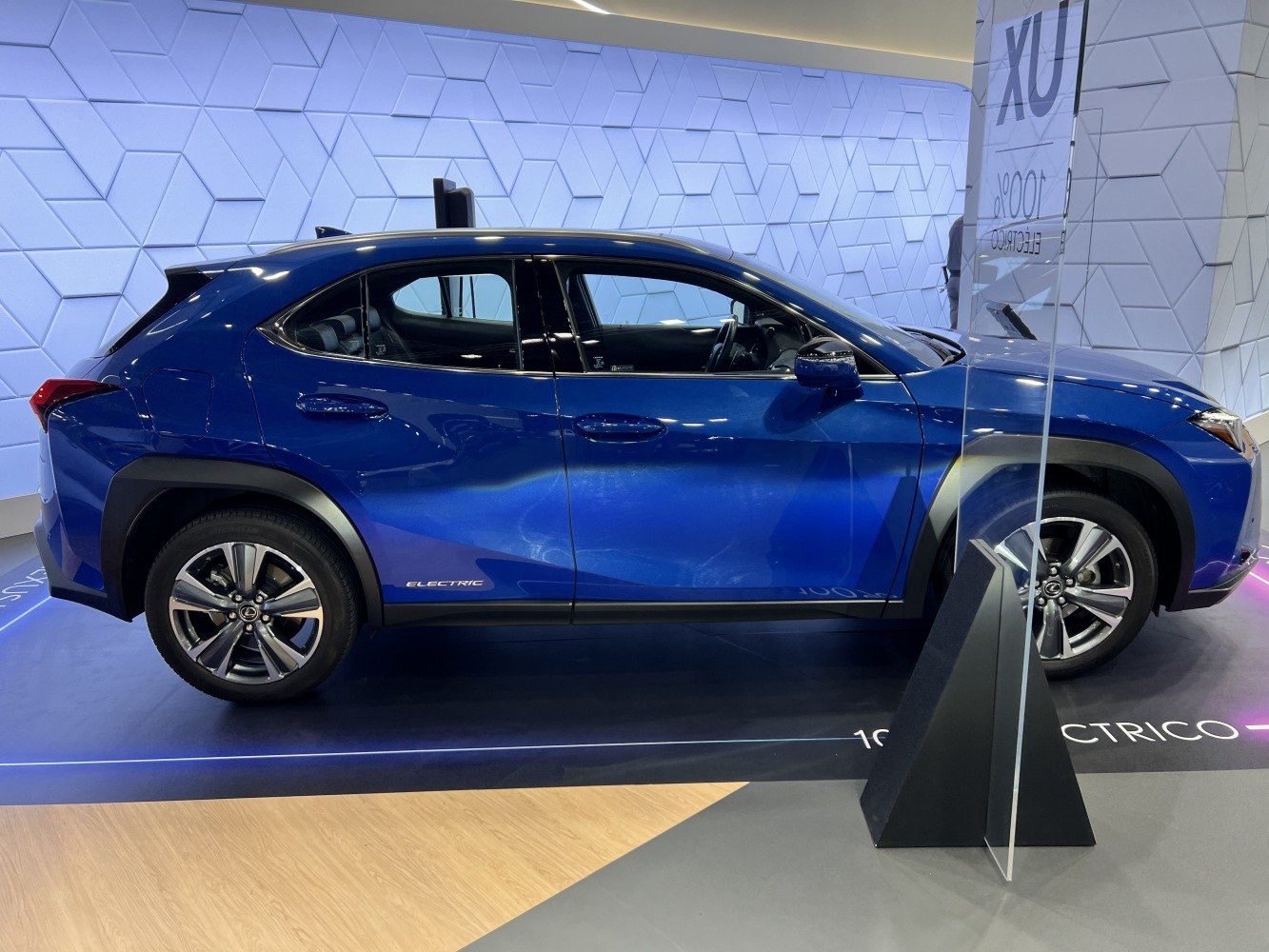 Side profile of sleek compact electric SUV with aerodynamic design and stylish alloy wheels