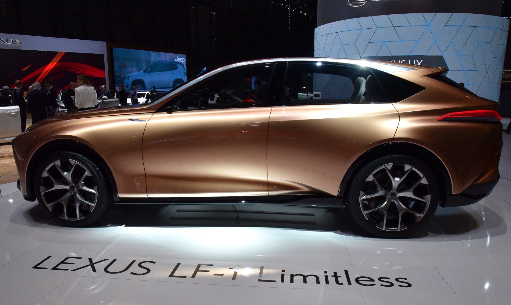 Side profile of sleek luxury concept SUV with large alloy wheels