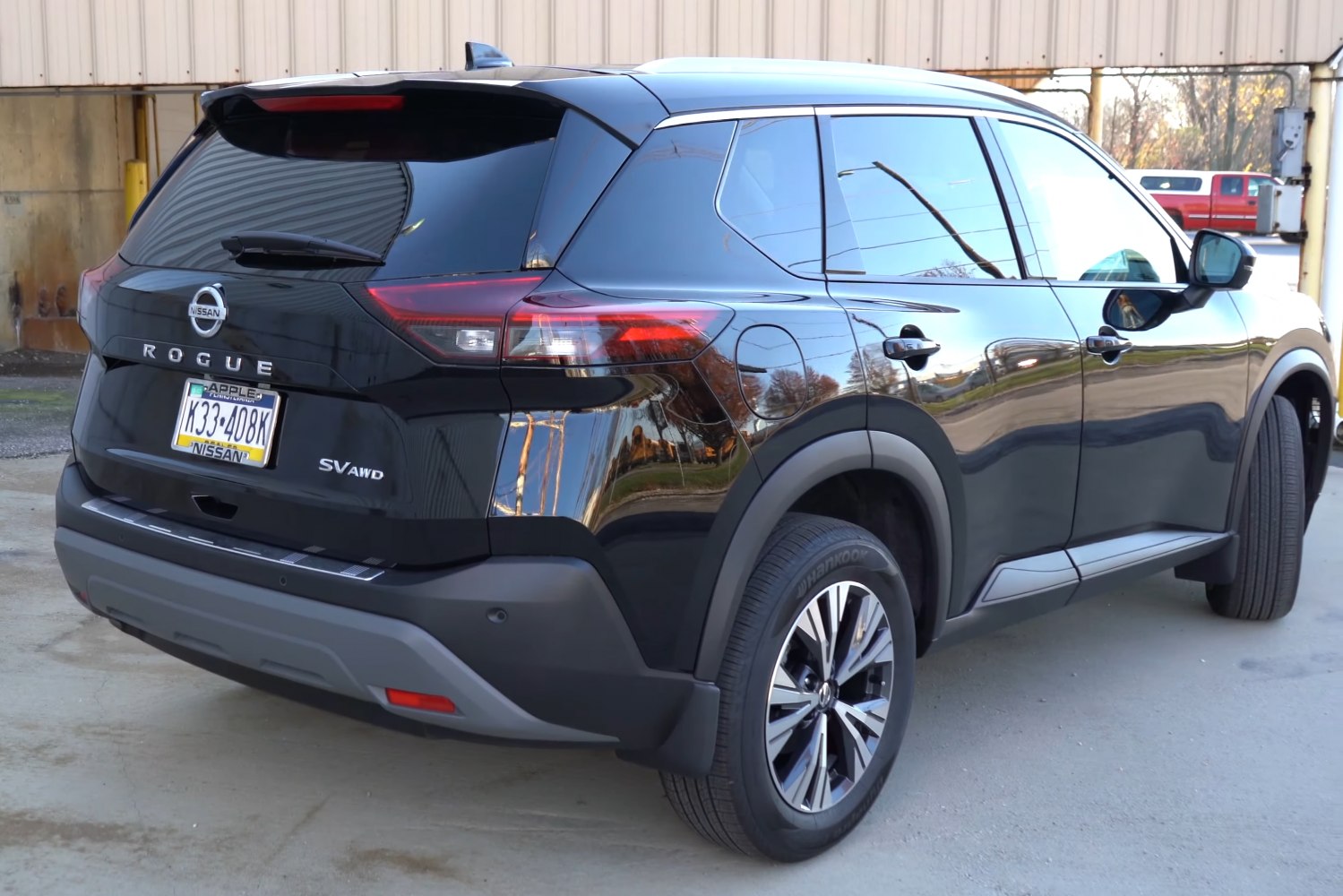 Rear and side view of an SUV with alloy wheels and tinted windows