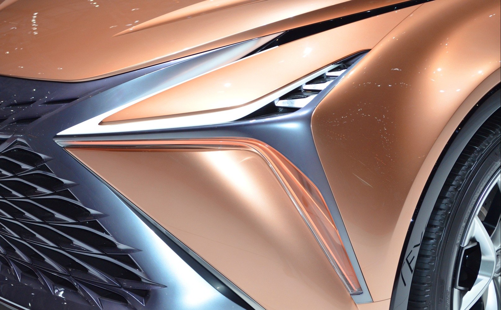 Futuristic front light and aggressive grille design on a concept SUV.