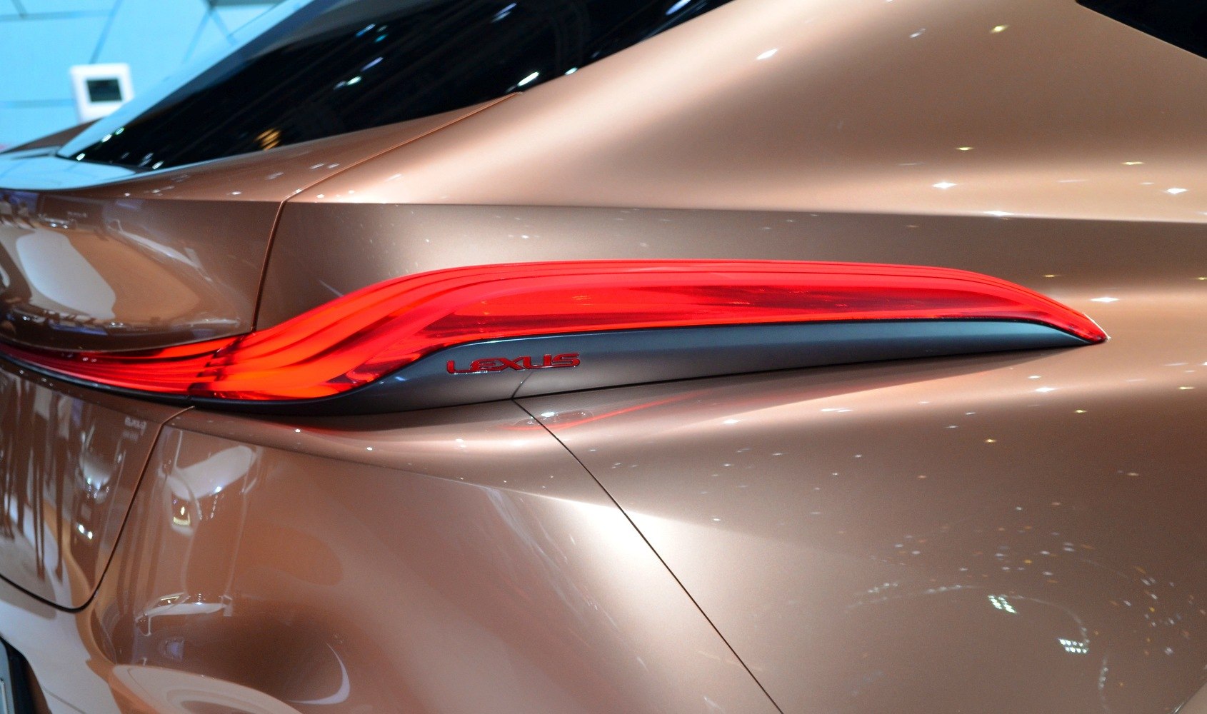 Sleek curved rear LED taillight with Lexus emblem