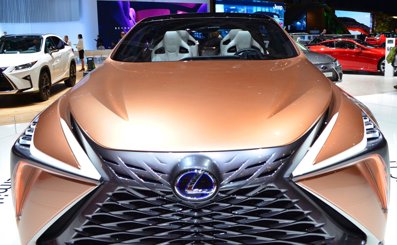 Futuristic front grille with distinctive daytime running lights and white sport seats