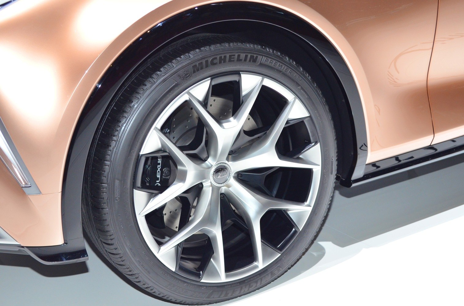 Alloy wheel with Michelin tire and Lexus-branded brake caliper