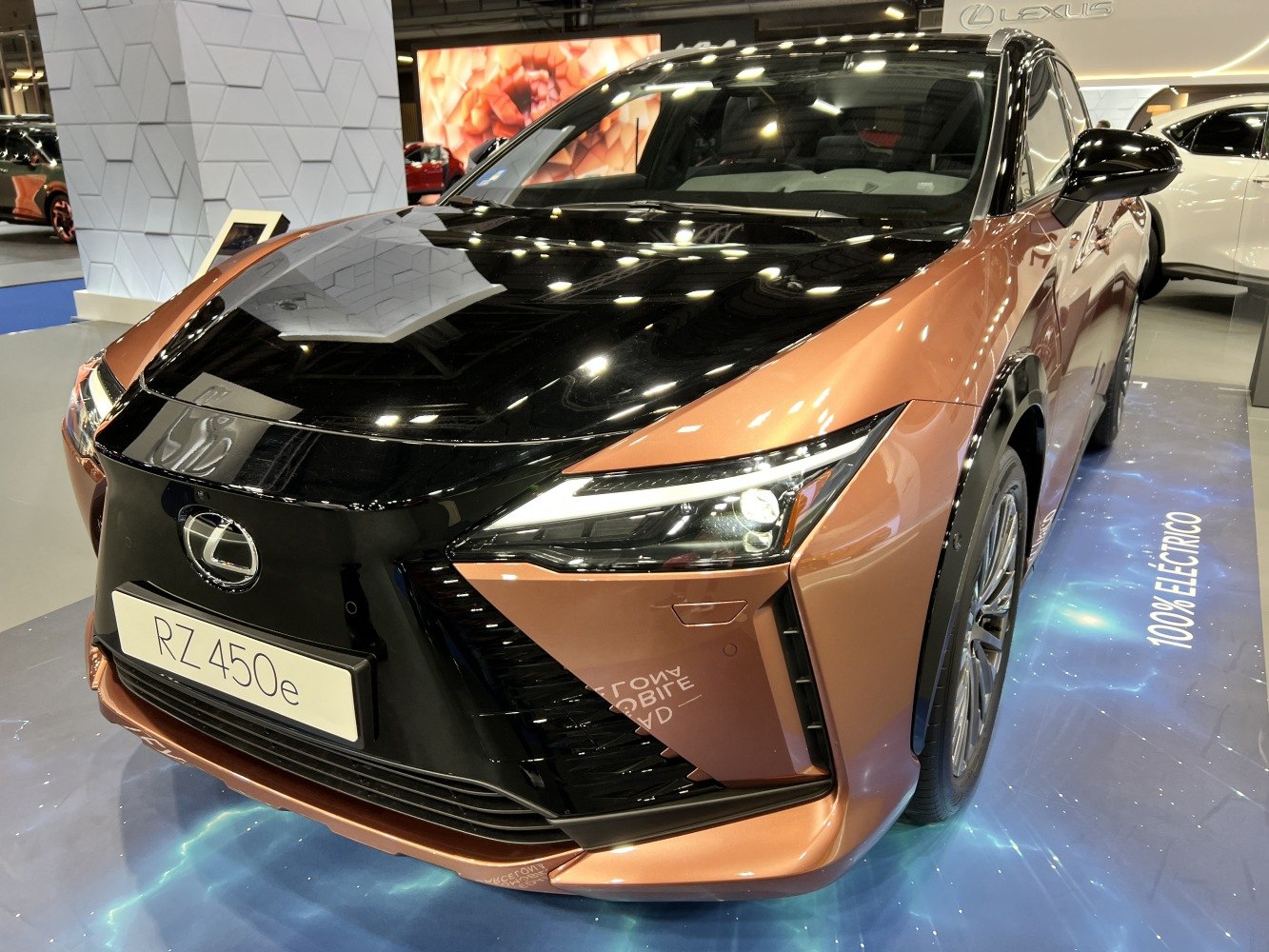 Front exterior with distinctive headlights and glossy black grille.