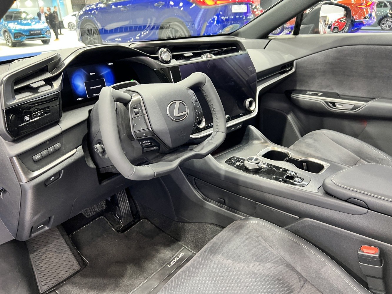 Rectangular steering wheel and digital dashboard in luxury SUV interior