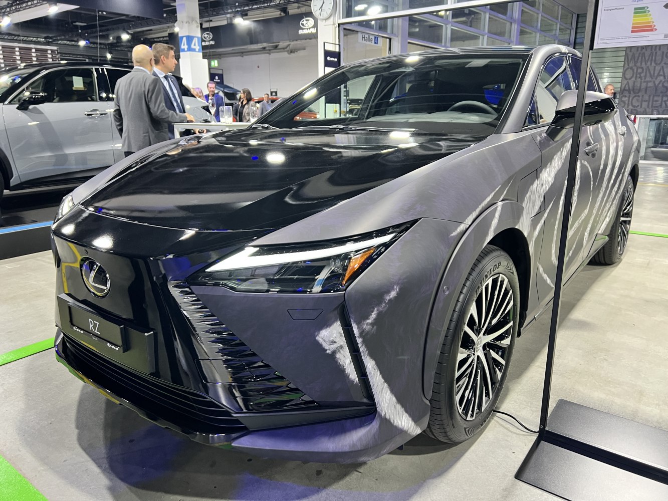 Sharp LED headlights with bold front grille and aerodynamic front end.