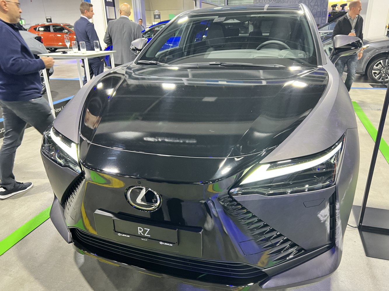 Front view with sharp LED headlights and sleek hood design