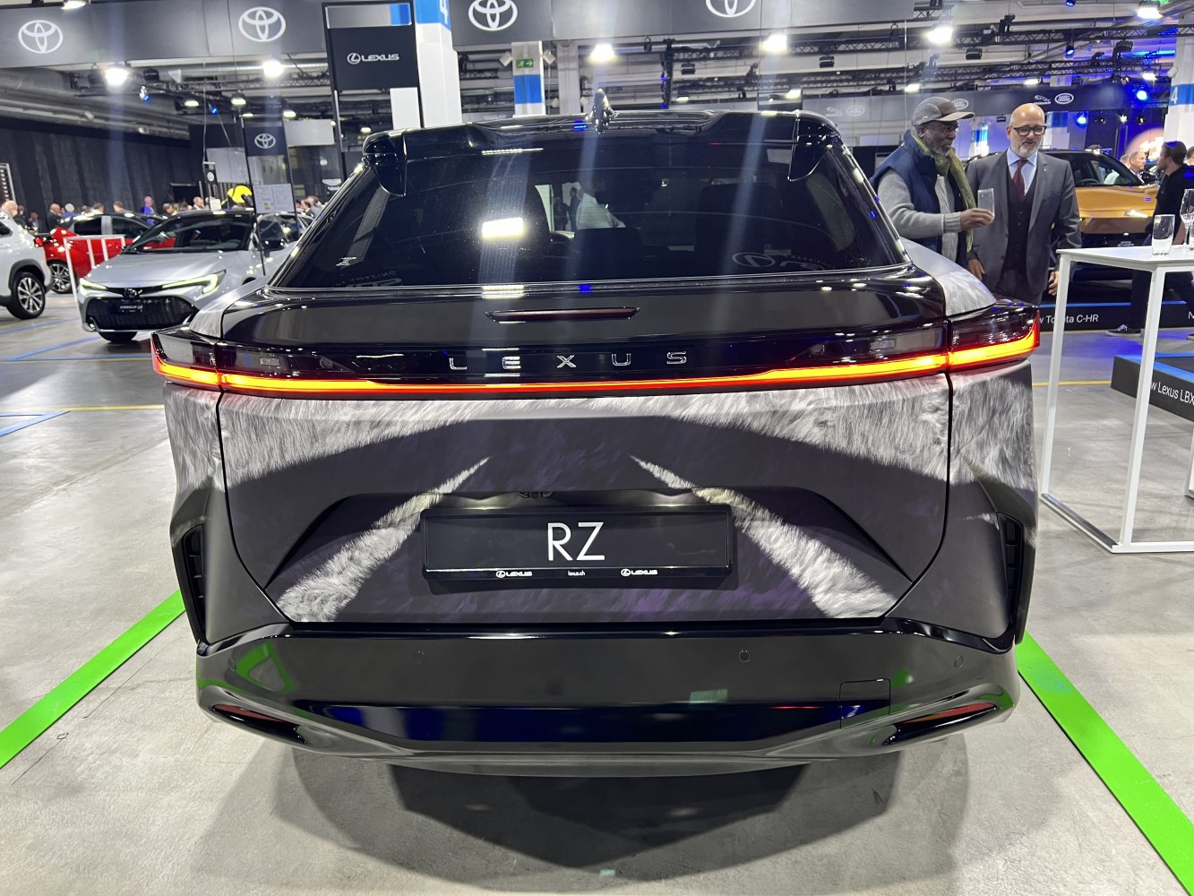 Rear view of SUV with full-width LED light bar and modern tailgate design
