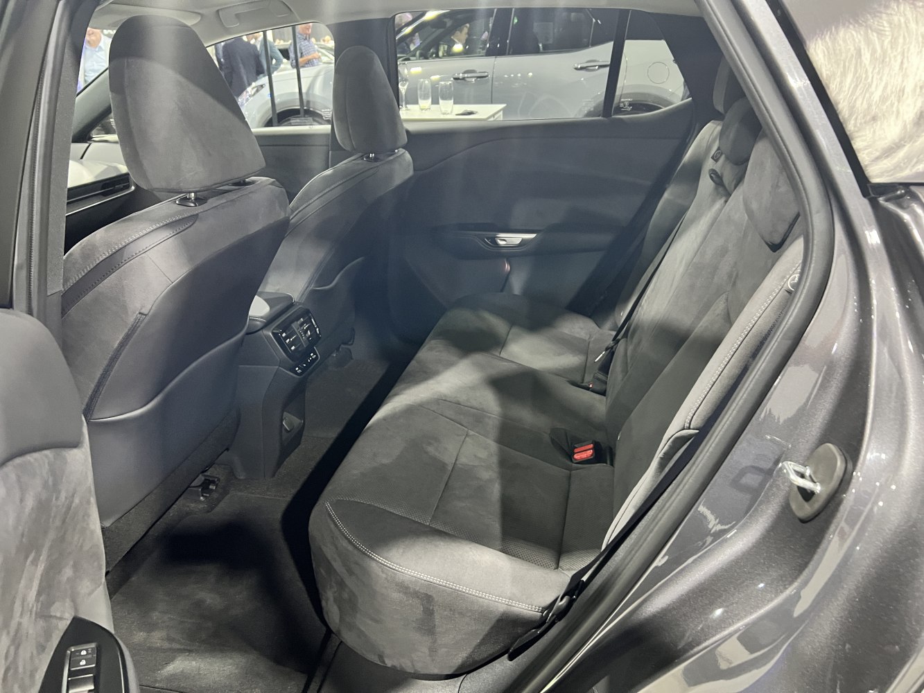Spacious rear seating with modern upholstery and controls