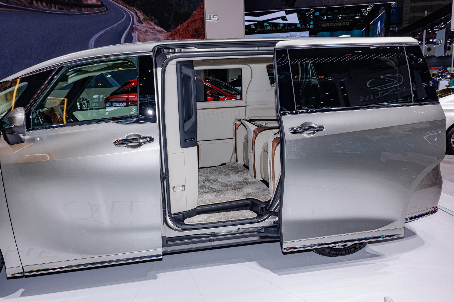 Open sliding door with plush rear seating and luxurious interior details