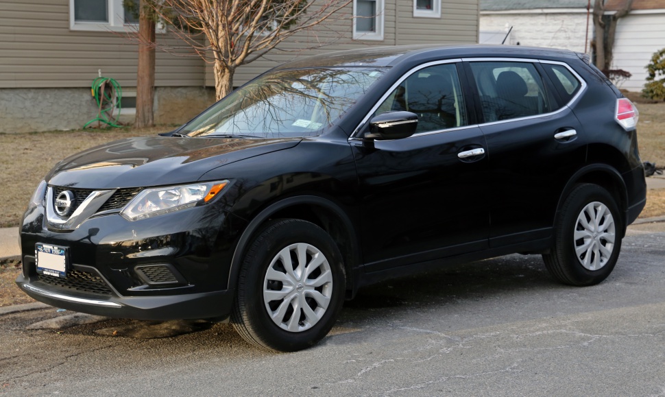 Black mid-size SUV with chrome accents and alloy wheels, side view