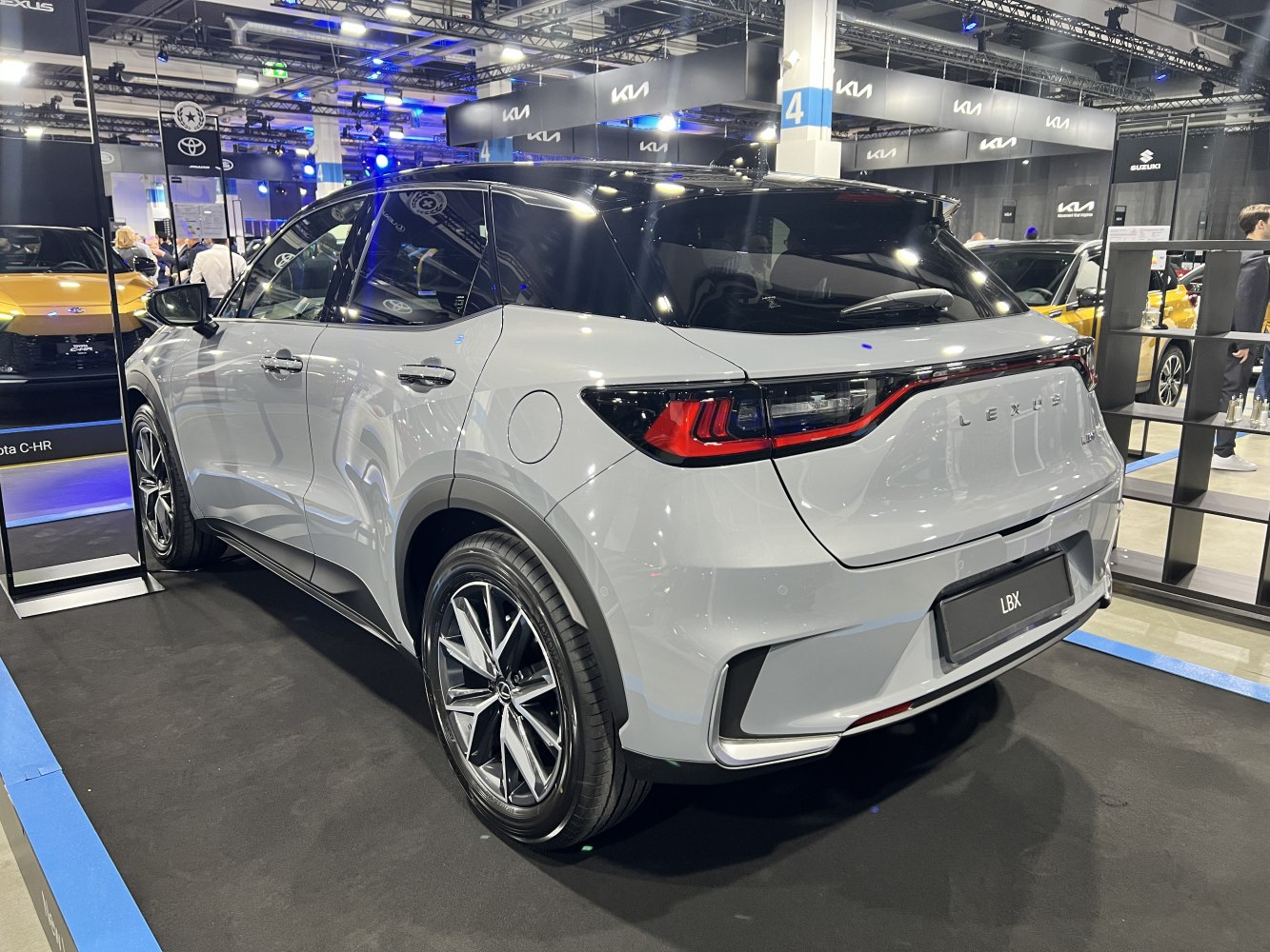 Rear side profile with sleek tail lights and two-tone paint on compact SUV