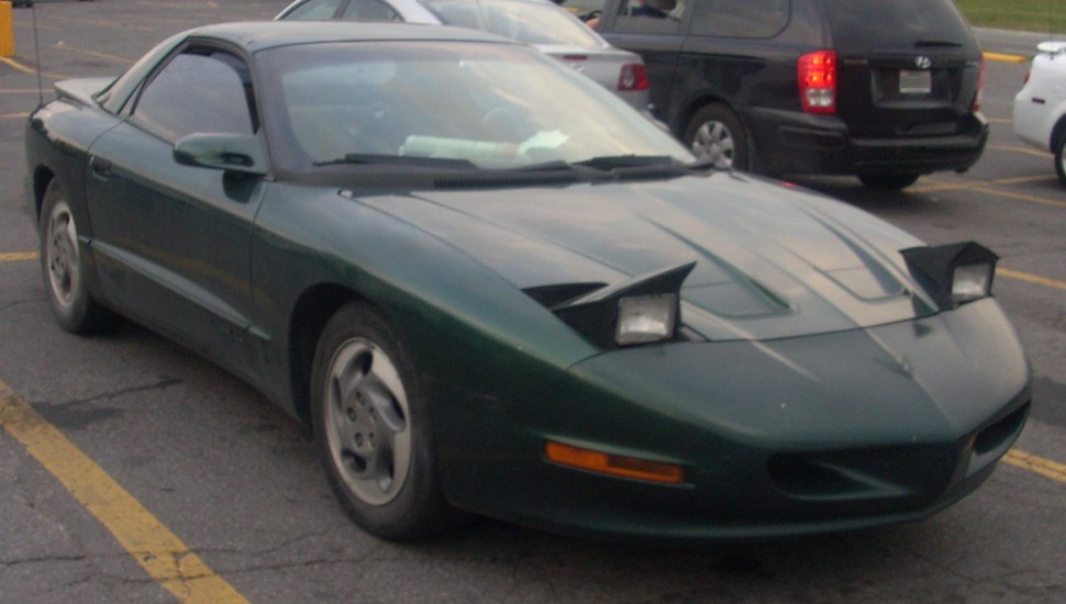 Pop-up headlights and aerodynamic sleek coupe design
