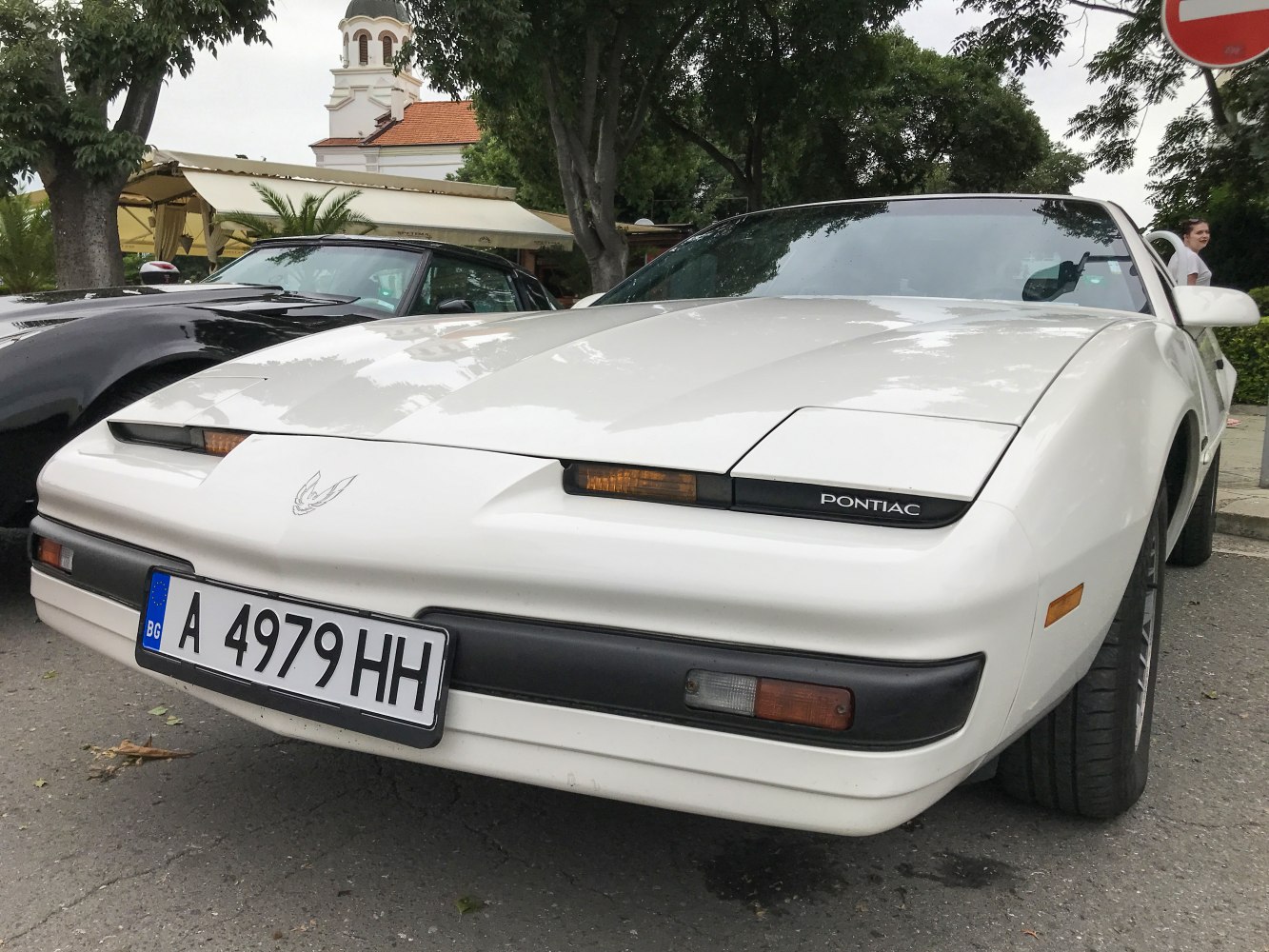 Front end with pop-up headlights and sleek aerodynamic design.