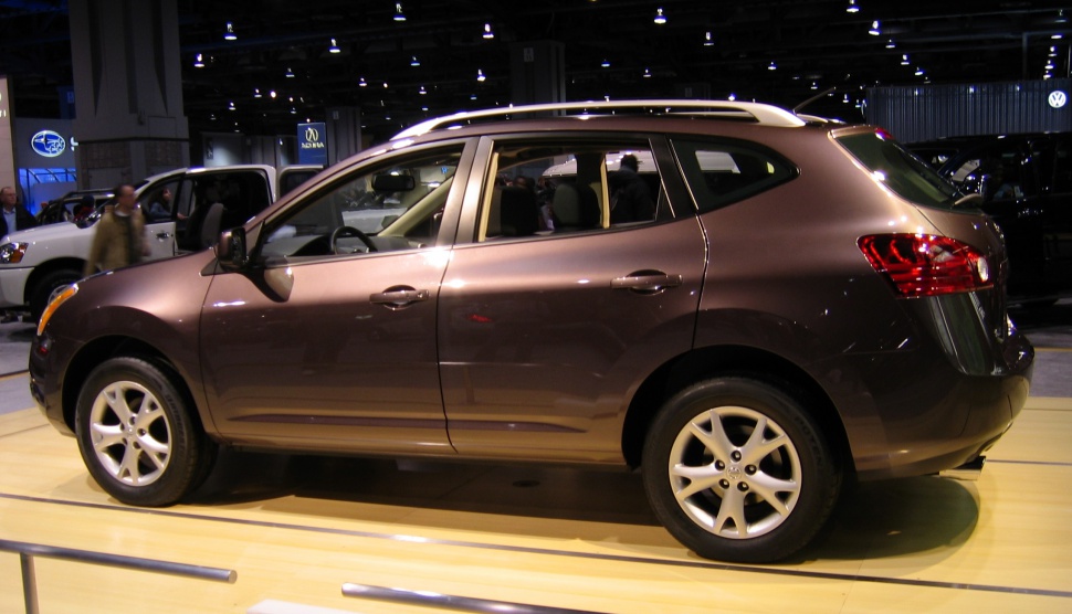 Side profile of mid-size crossover with alloy wheels on display.