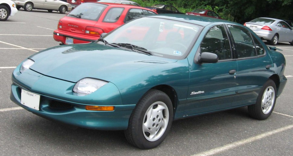 1995 sedan with pop-up headlights and compact front design
