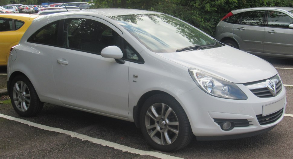 White 3-door hatchback side profile with alloy wheels
