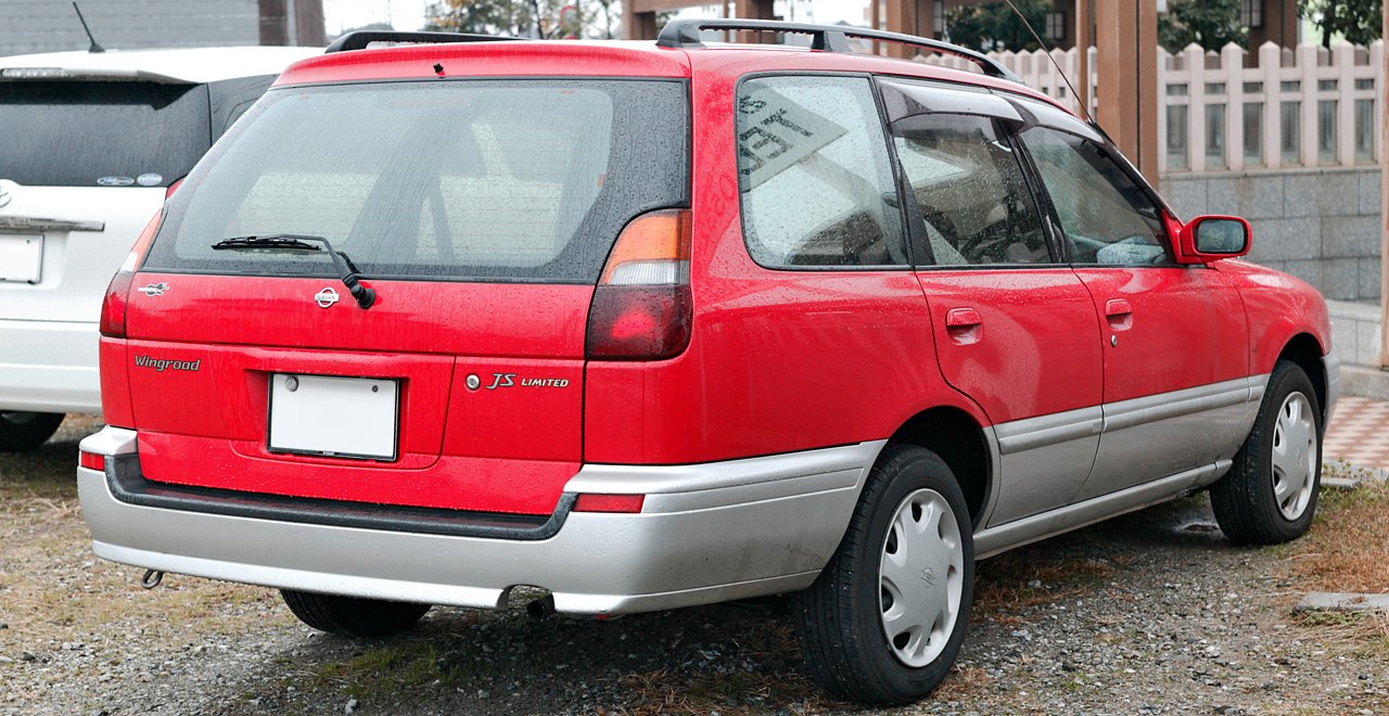 Rear view of red station wagon with silver lower bumper and distinct taillights