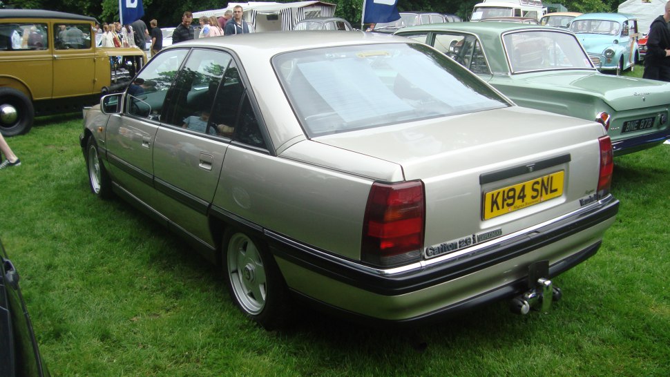 Rear view of four-door sedan with distinct taillights and smooth lines