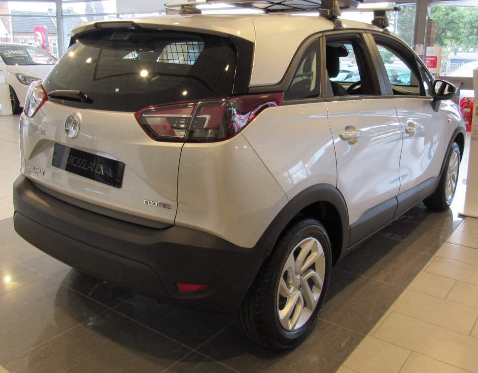 Rear and side view with taillights and roof rack