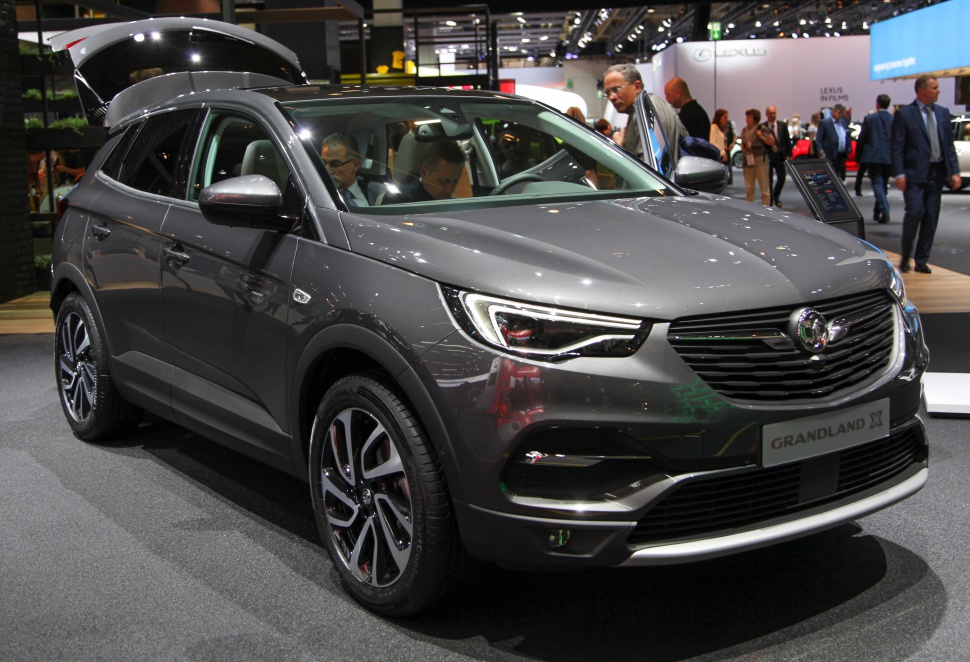 Front and side view of SUV with LED headlights and alloy wheels