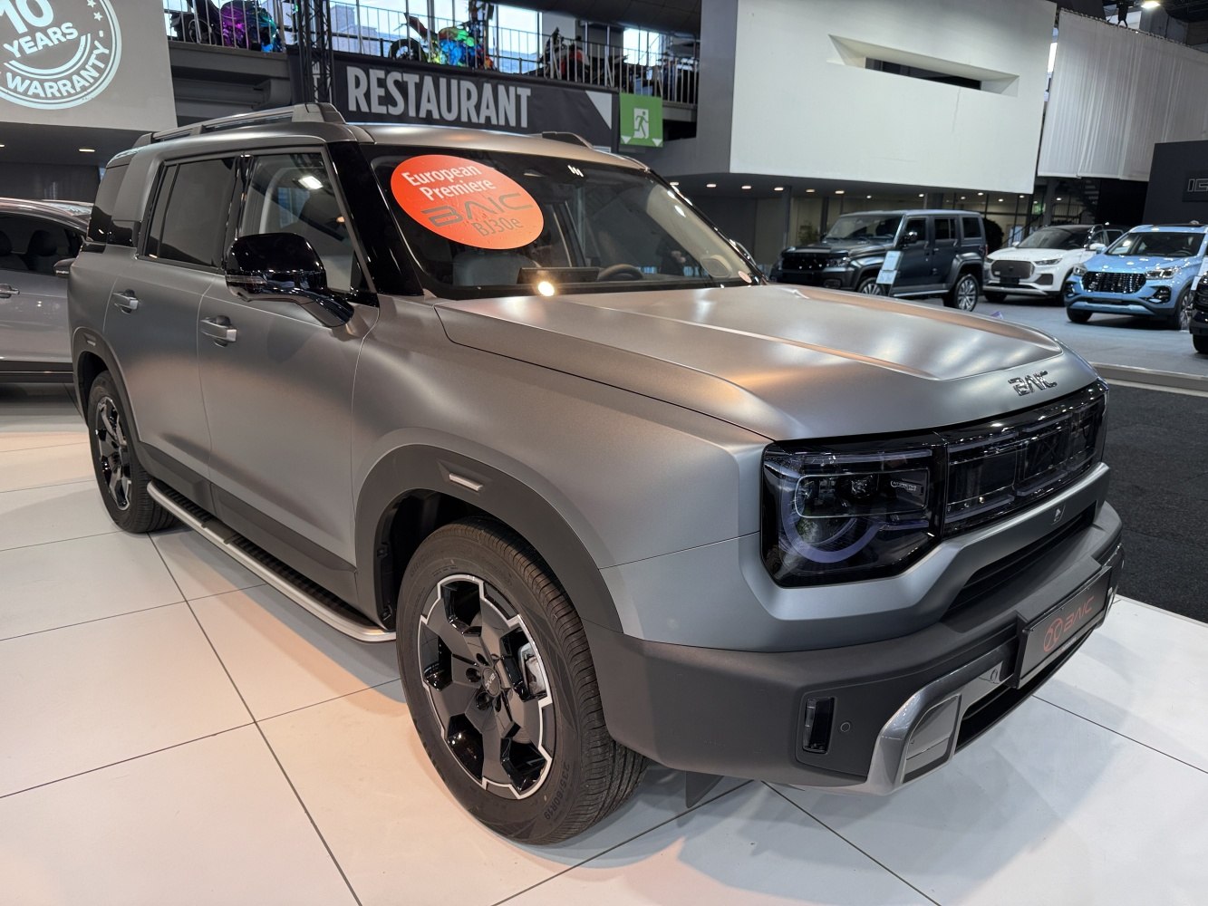 Matte finish SUV with LED headlights and bold grille