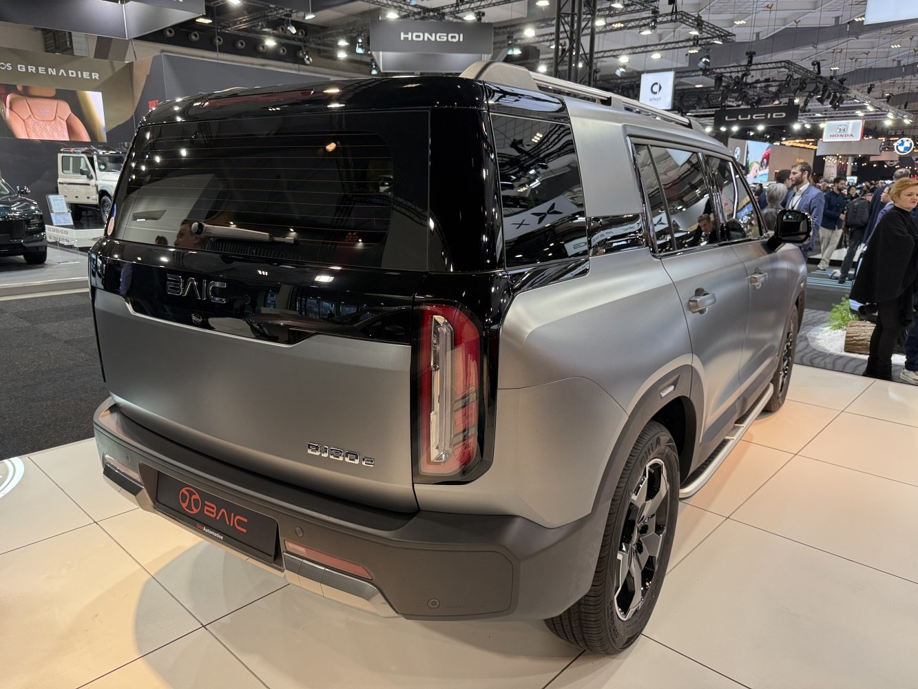 Matte two-tone SUV rear with vertical taillights and rear window wiper