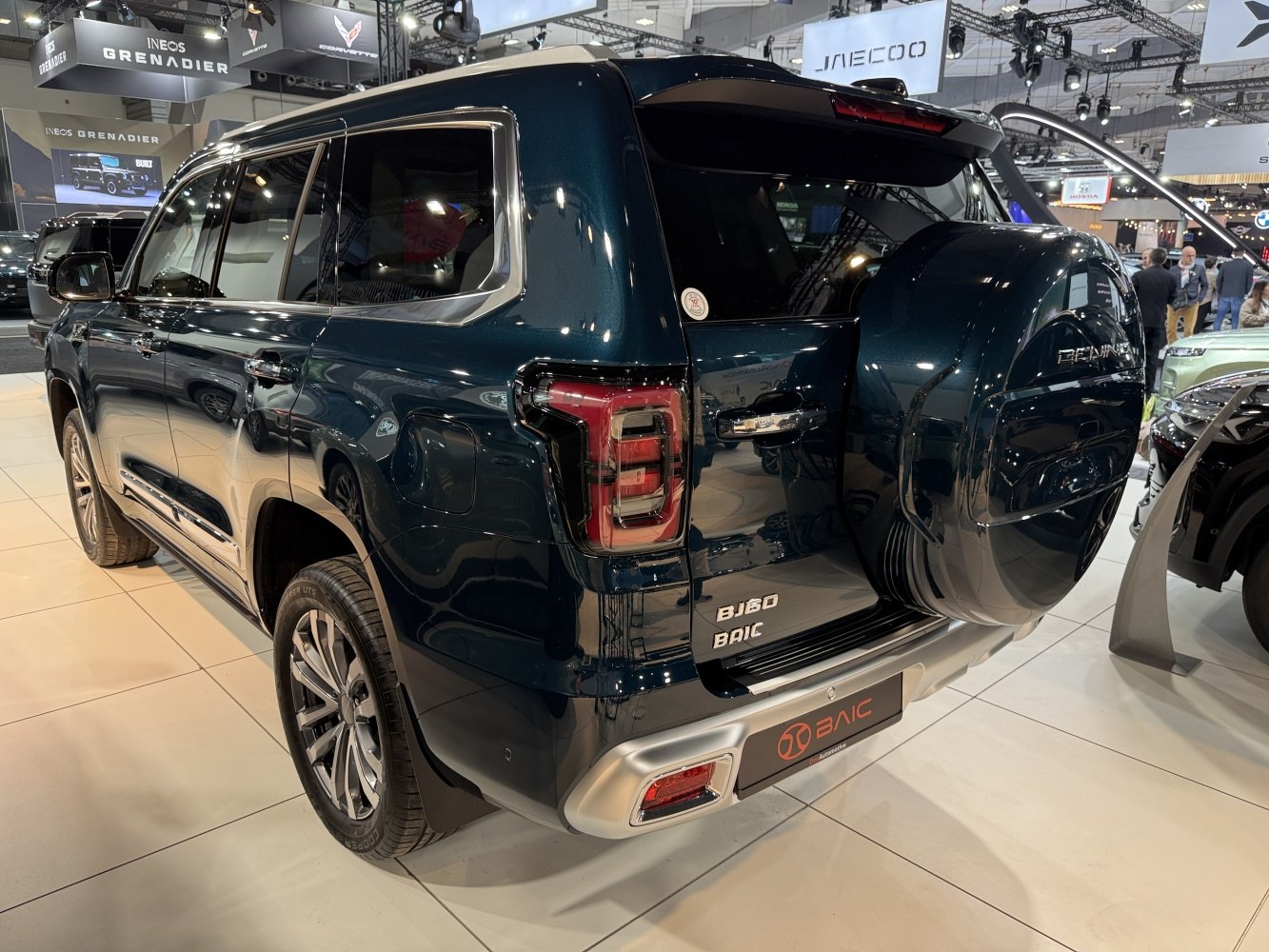 SUV rear with spare tire cover and modern taillight design