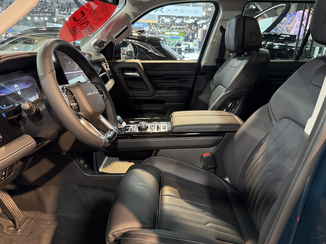 Luxury black leather seats and modern digital dashboard with center console