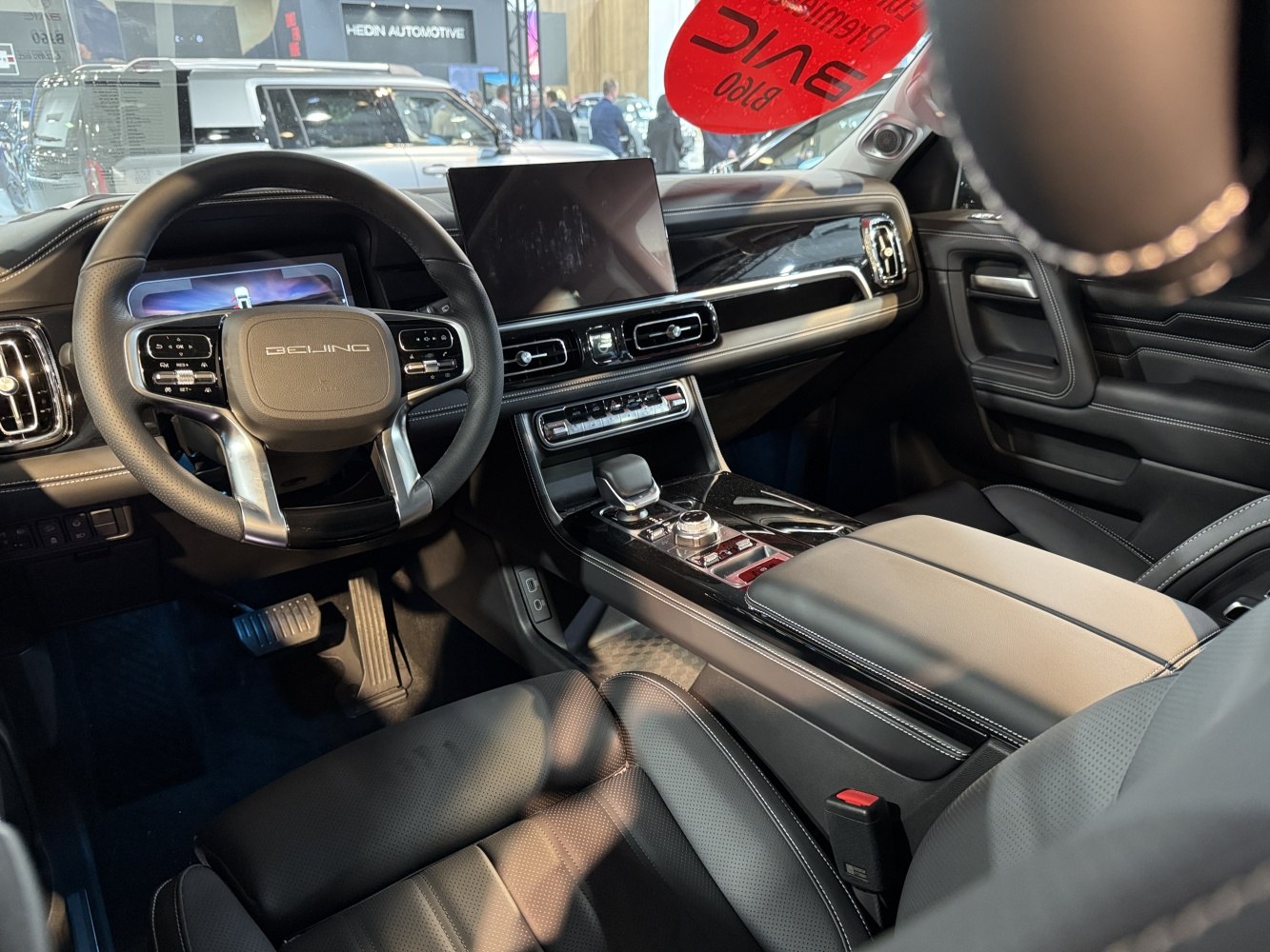 Modern digital dashboard and touchscreen infotainment with multifunction steering wheel