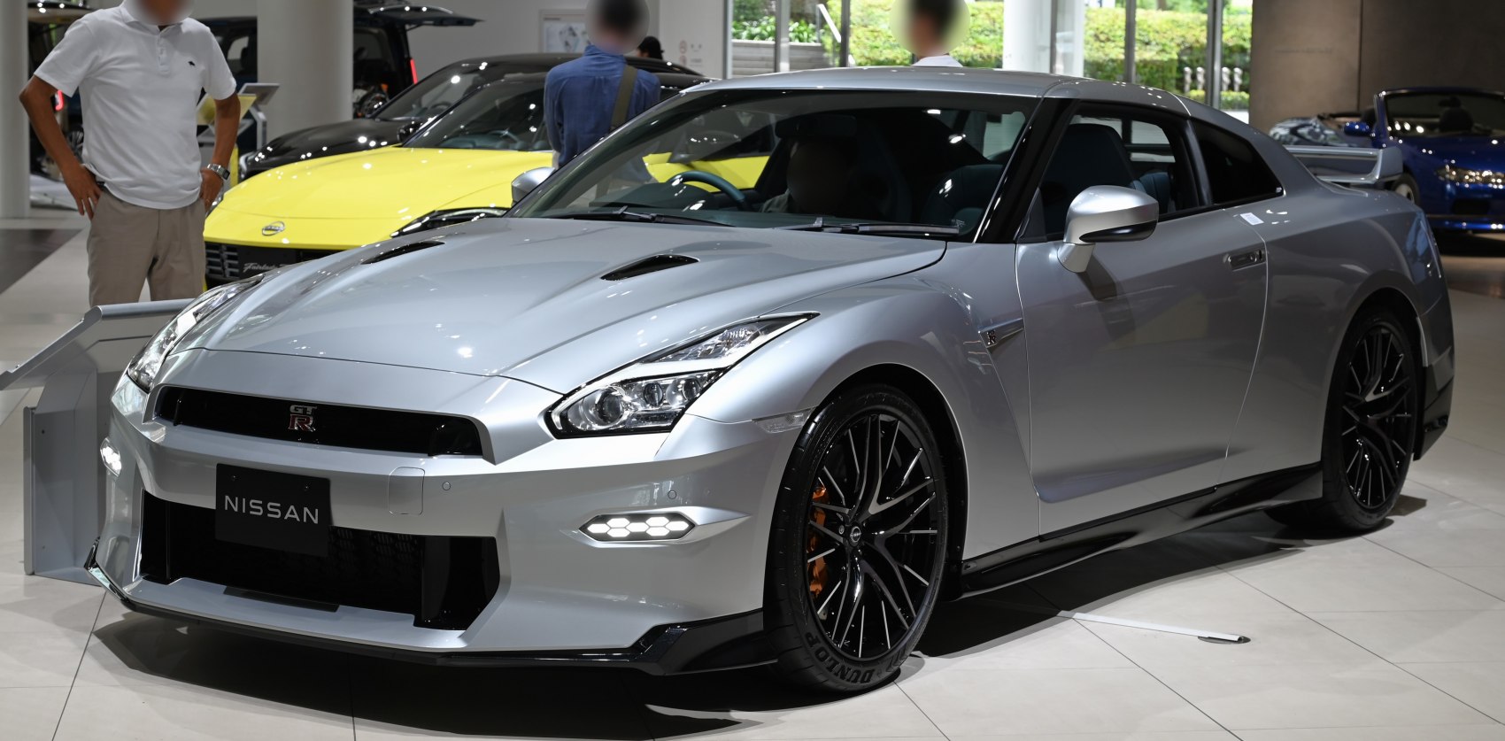 Silver sports coupe with LED headlights and black multi-spoke wheels