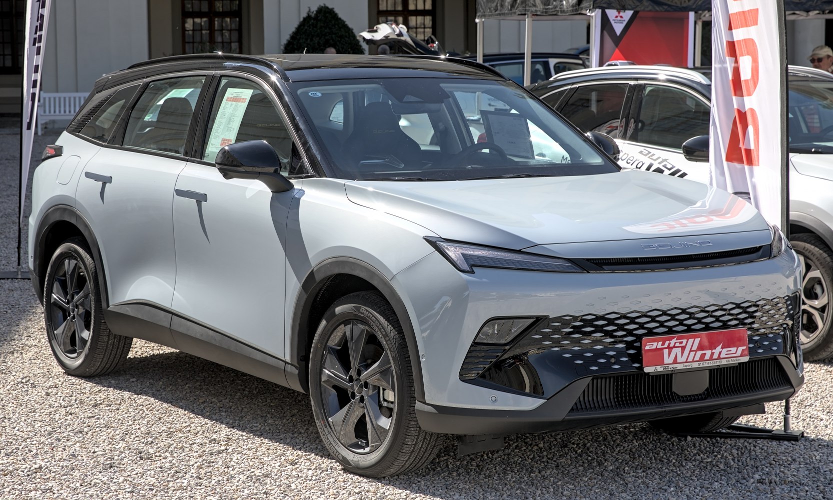 Modern SUV with LED headlights and two-tone black roof