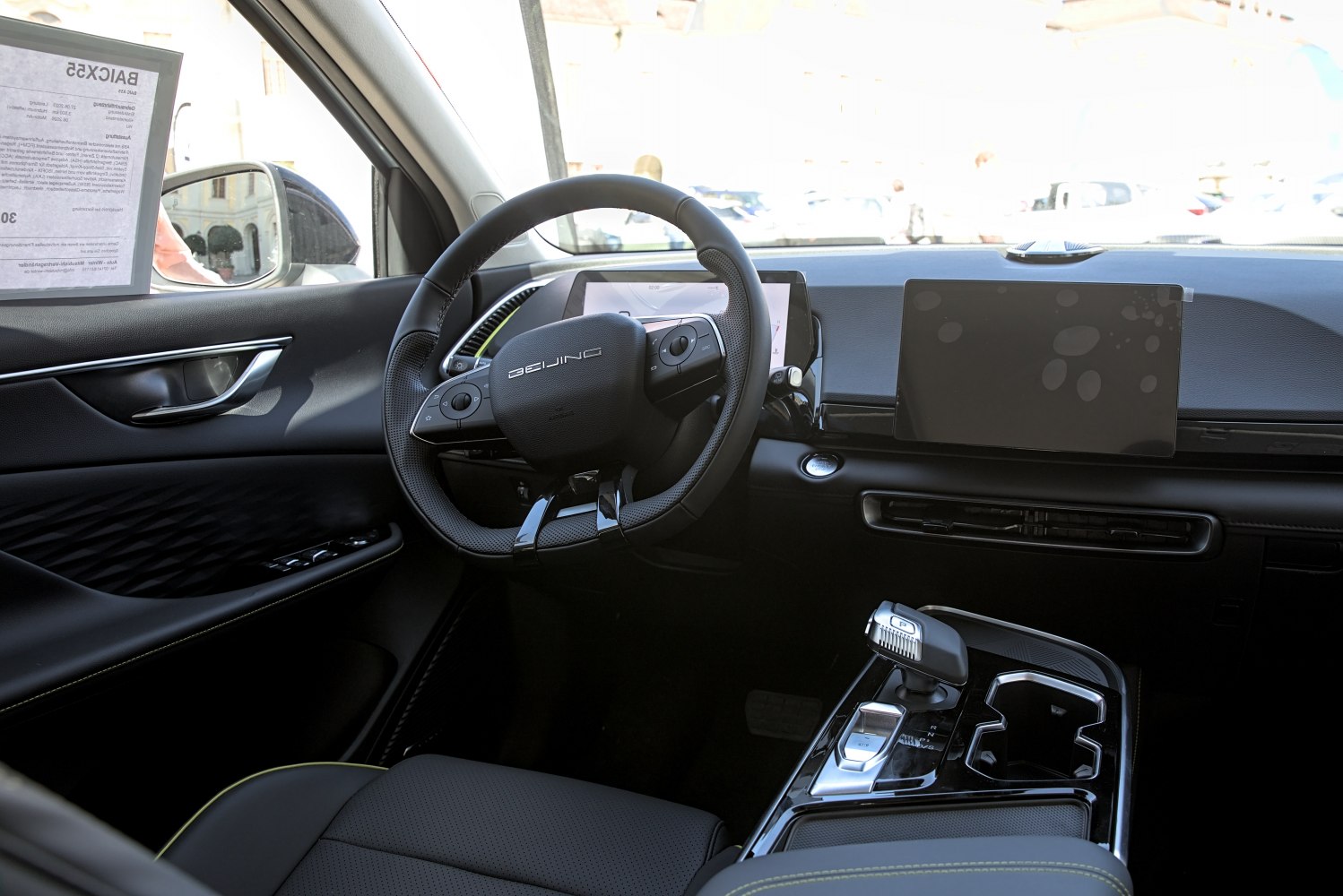 Digital dashboard, modern steering wheel, advanced gear selector