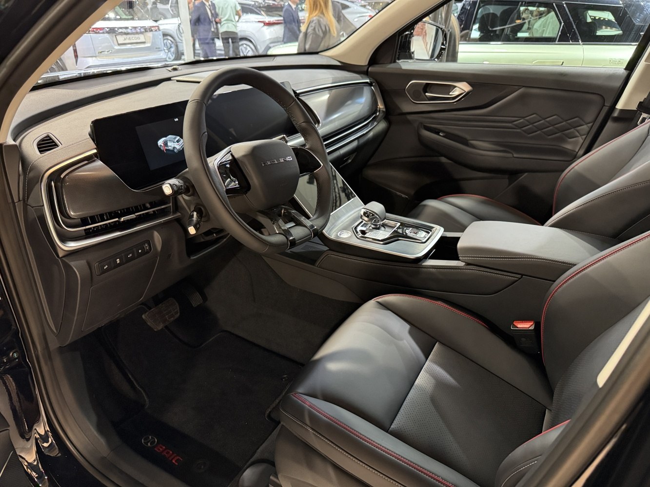 Modern car interior with digital dashboard and leather seats