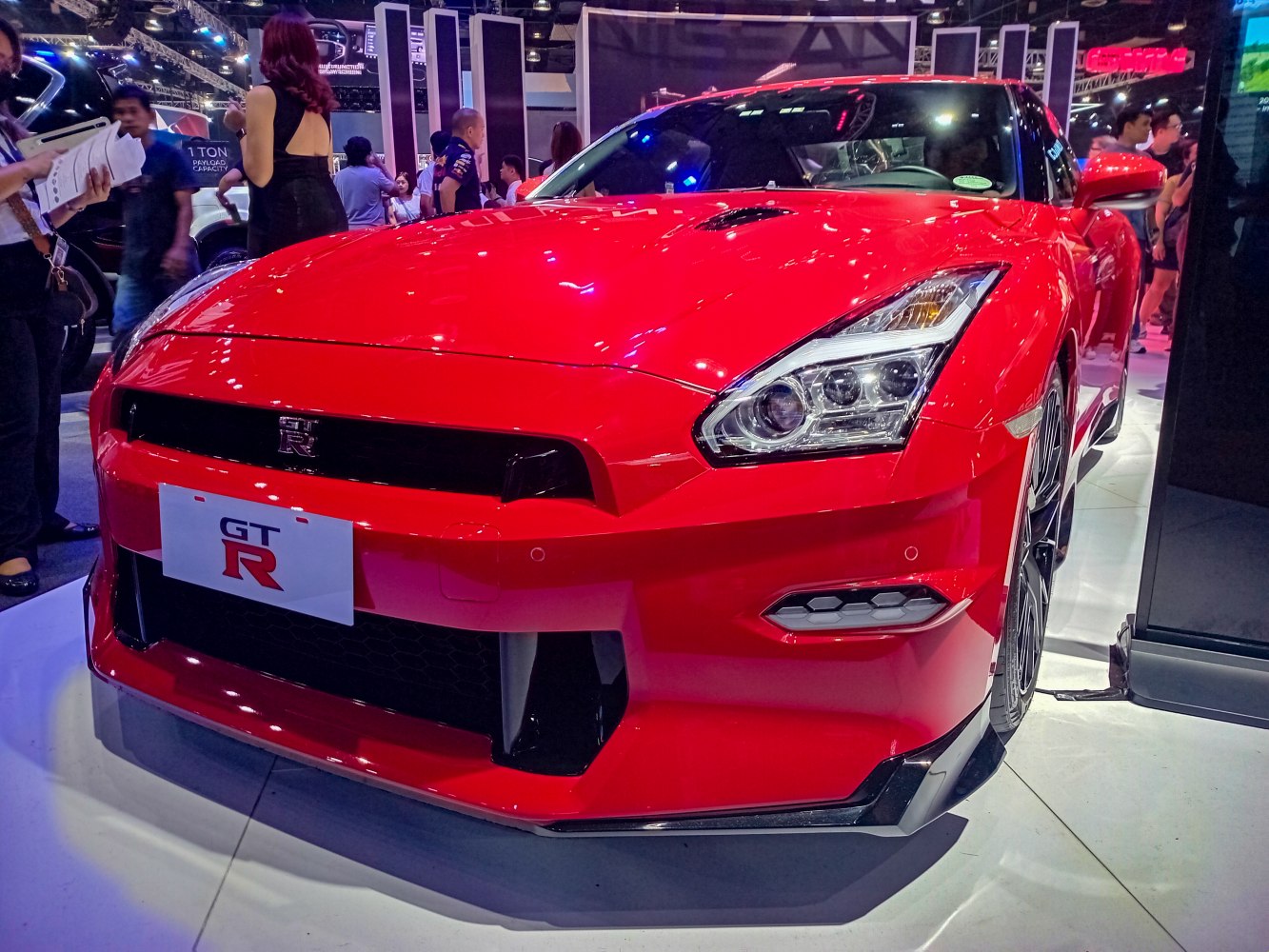 Aggressive front end with detailed headlights and aerodynamic design