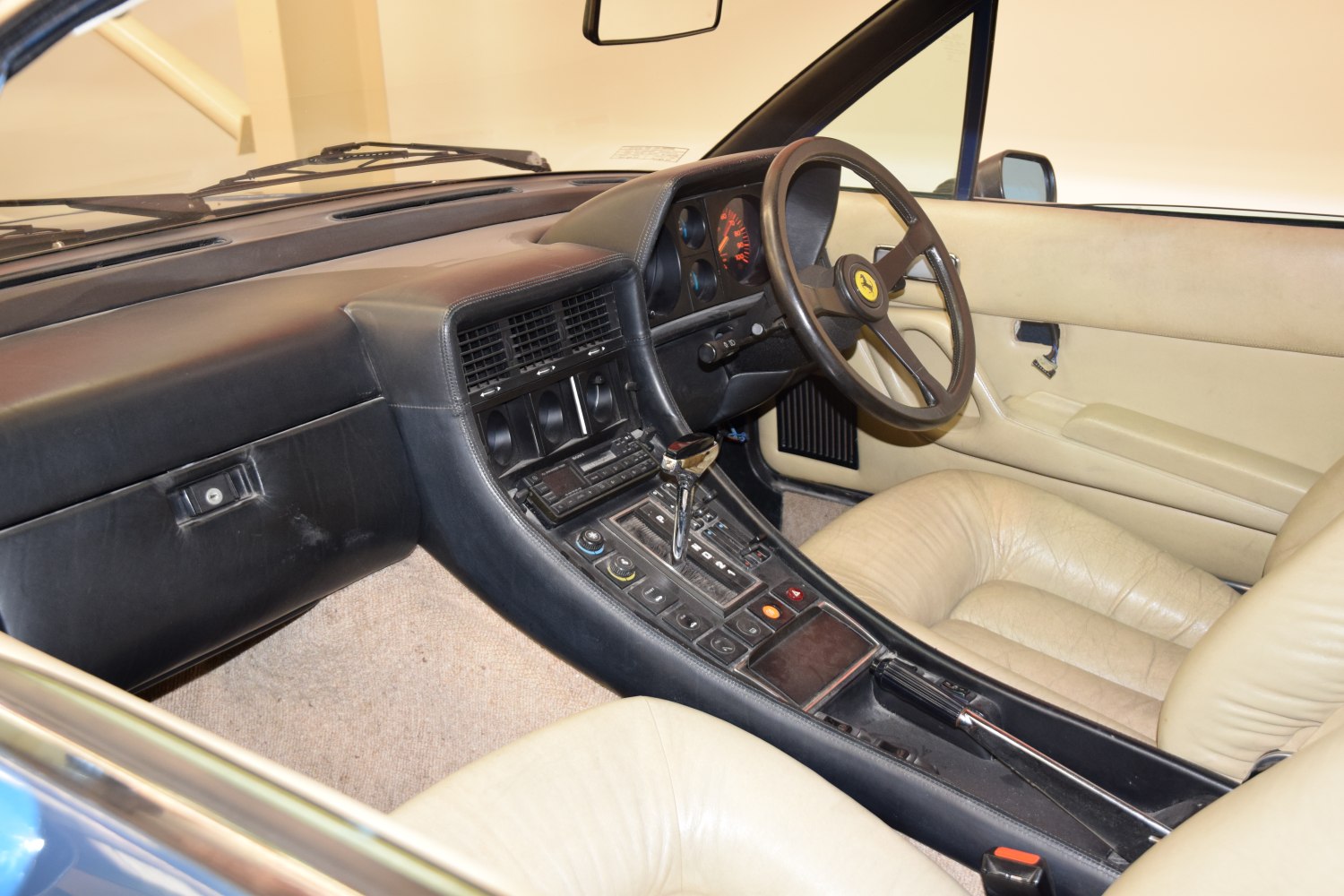 Classic car interior with central console and vintage dashboard