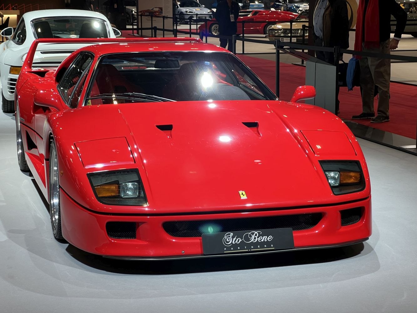 Front view showing aerodynamic hood vents and integrated headlights of a sports car.