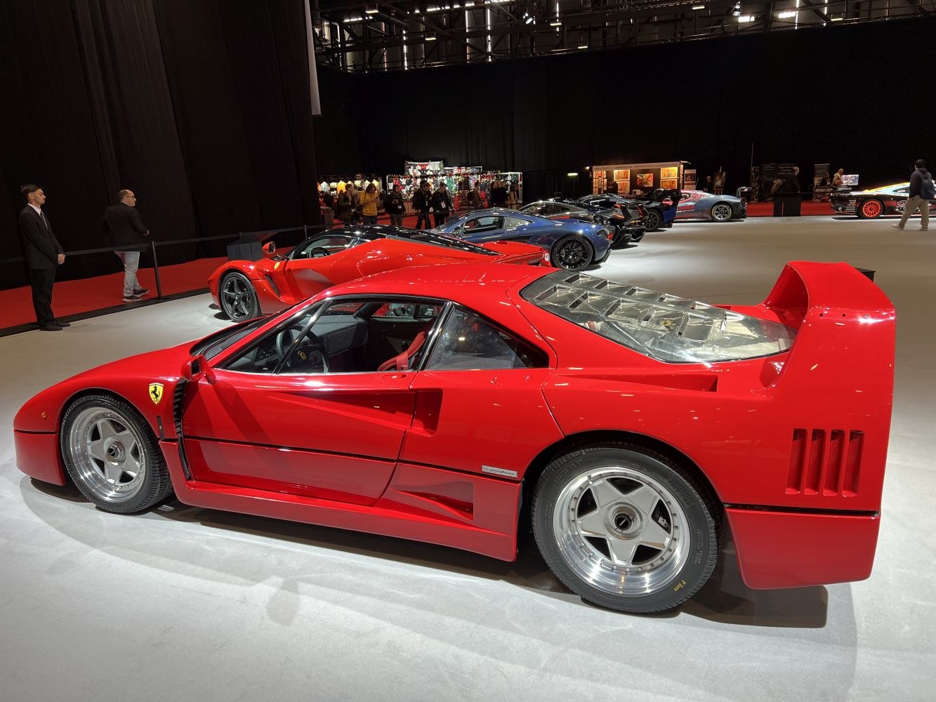 Rear side view with iconic wing and aerodynamic design