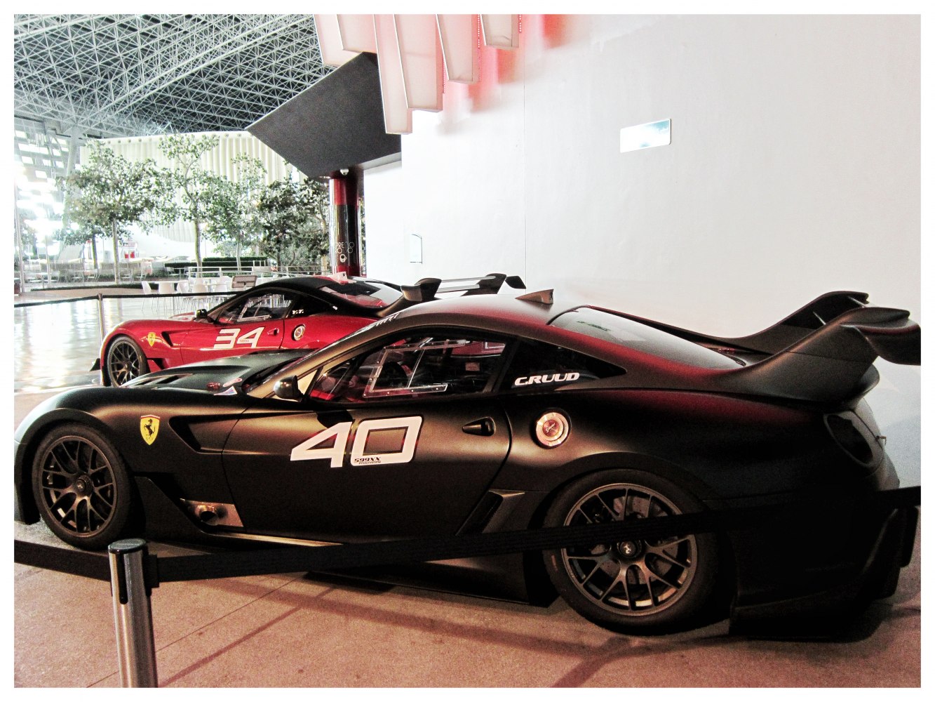 Side view of Ferrari 599XX race car with large aerodynamic rear wing