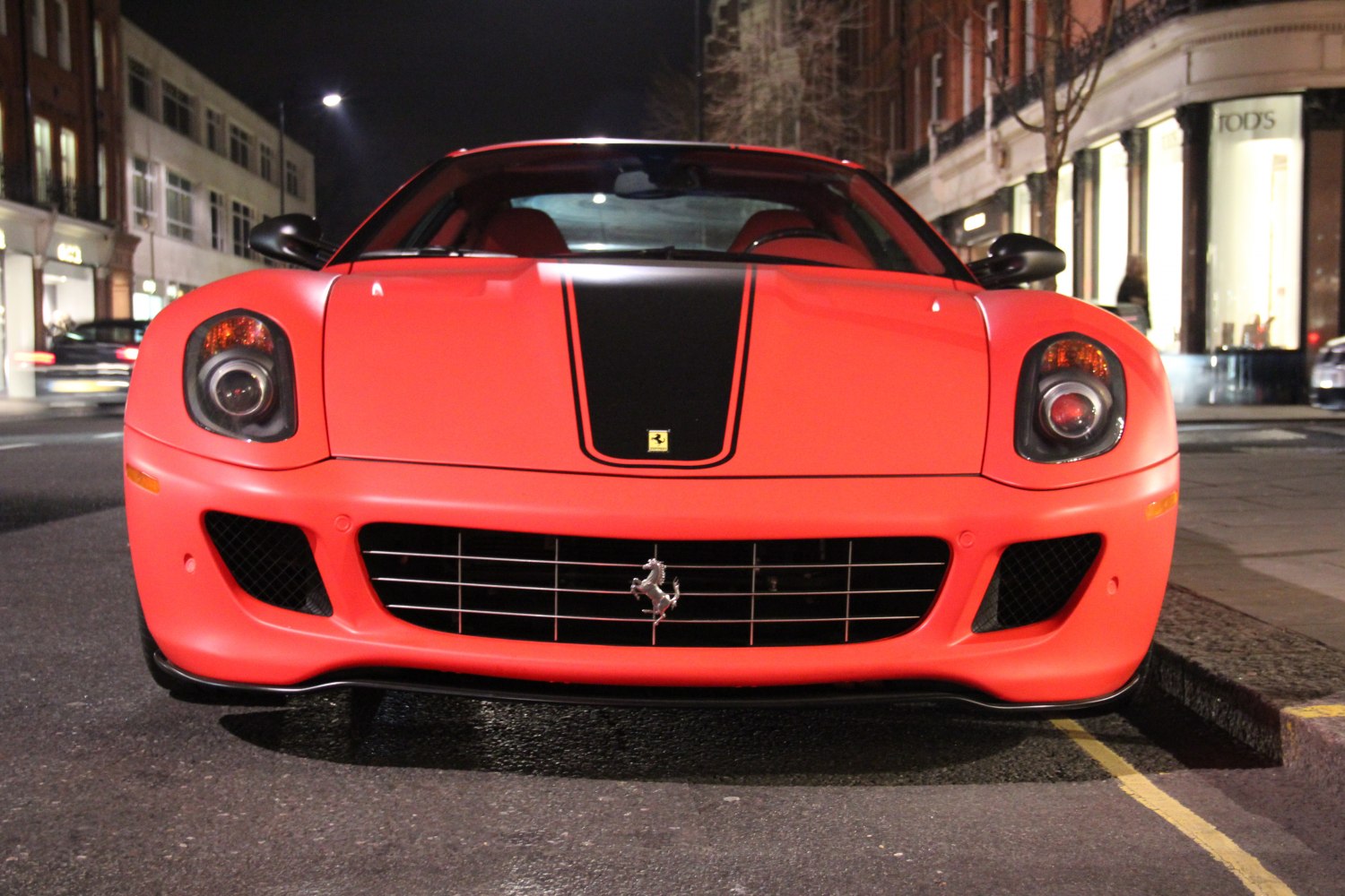 Front view with black racing stripe and dual headlights