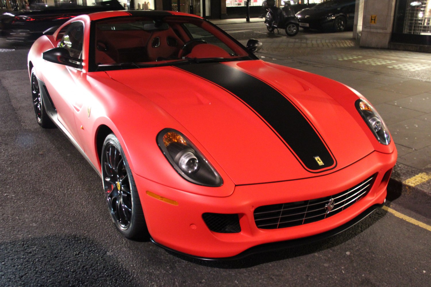 Front view with black racing stripe and black wheels