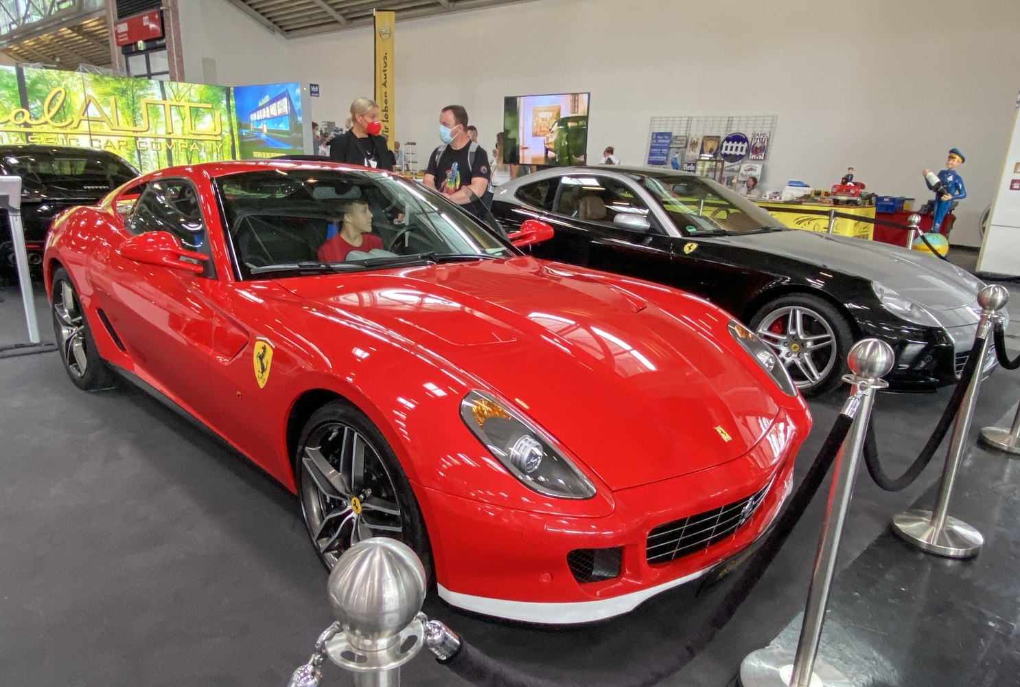 Front view with distinctive headlights and hood vents